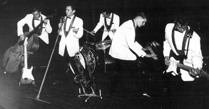 Note the piano player second from the right.